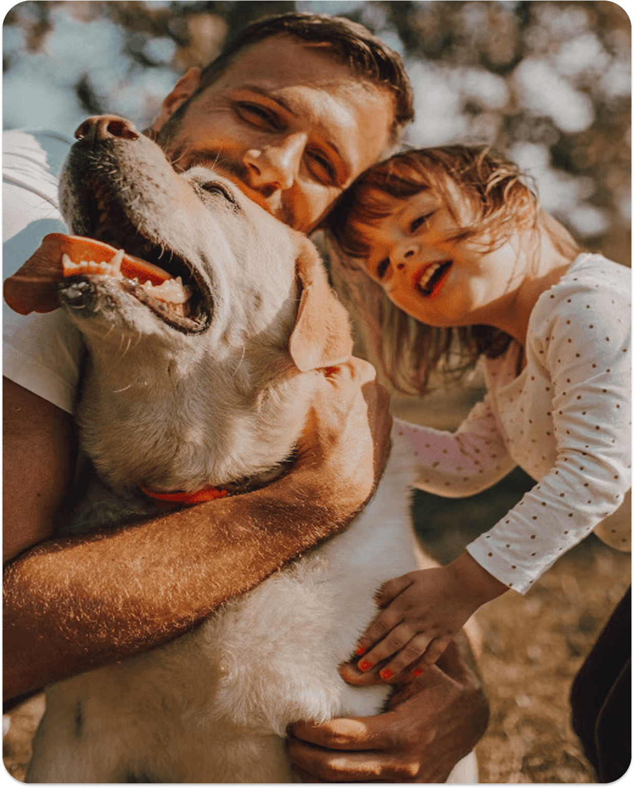 Joyful family moment with woman, child, and happy dog embracing outdoors, representing the peace of mind that comes with comprehensive insurance coverage for people and pets.