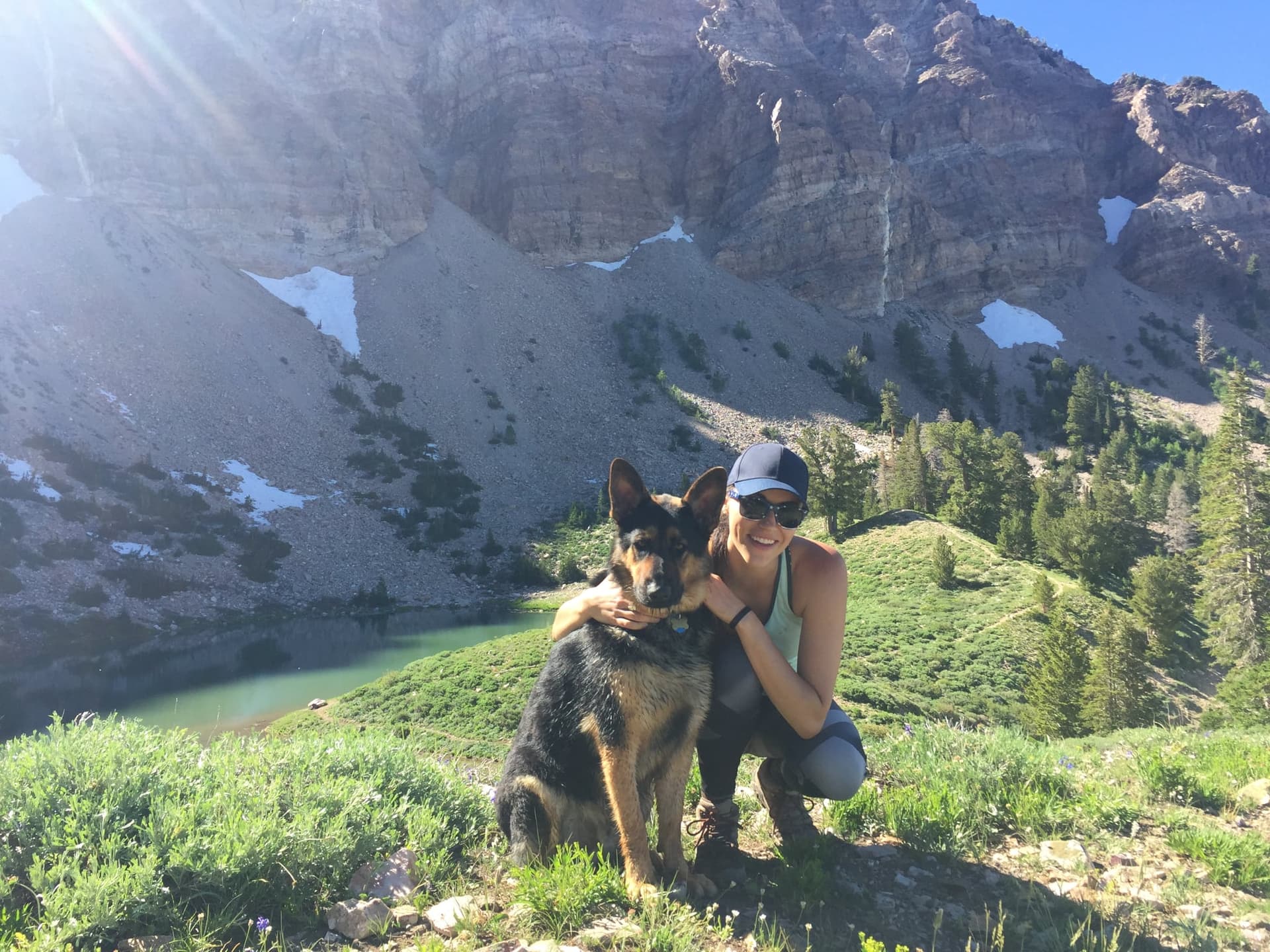Meredith Chamberland hiking with her German Shepherd, Bandit